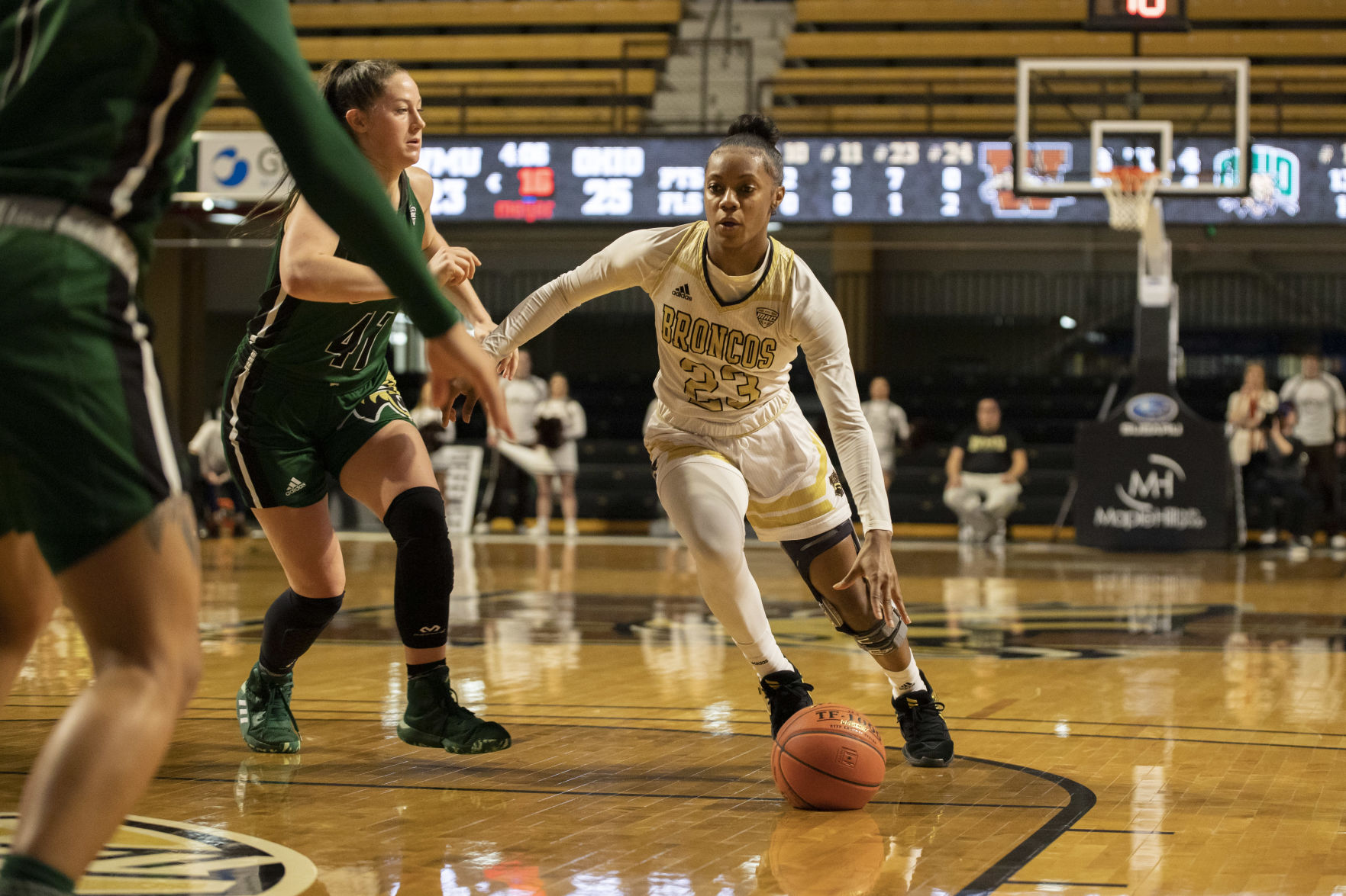 Redshirt Sophomore guard Jordan Walker dribbles into the key.